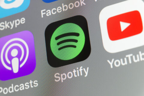 Spotify, Podcasts, Youtube and other cellphone Apps on iPhone screen