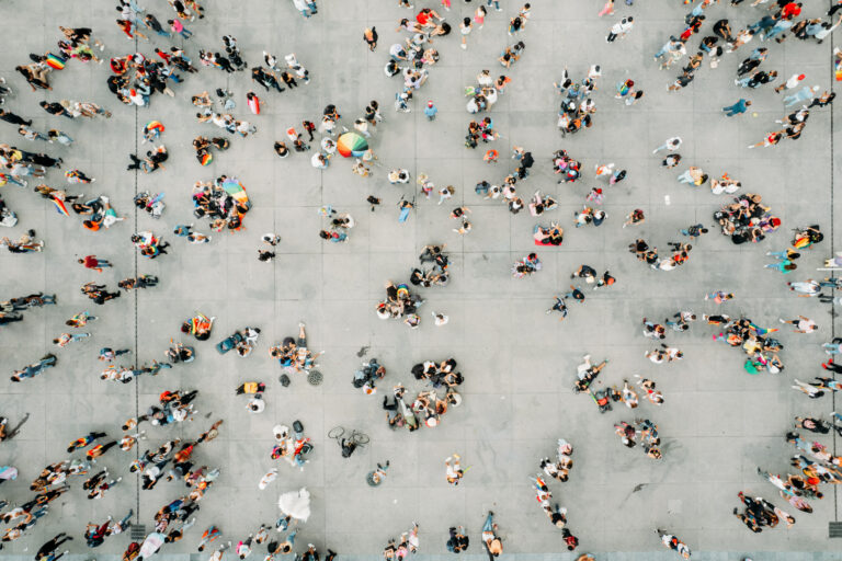 Aerial shot of people walking in a parade