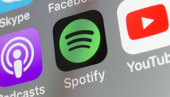 Spotify, Podcasts, Youtube and other cellphone Apps on iPhone screen
